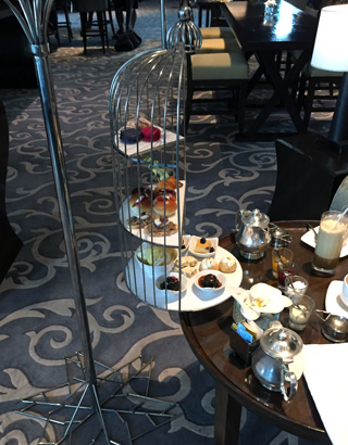 Afternoon tea at St. Regis Bangkok served in a birdcage