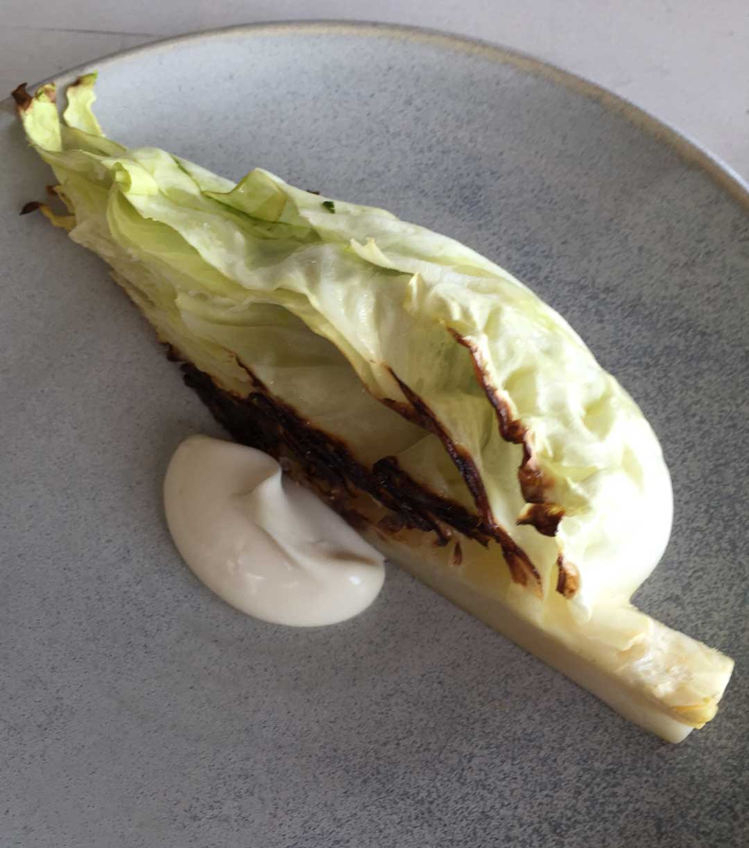 Kadeau Bornholm dish: grilled pointed cabbage stuffed with oysters and parsley
